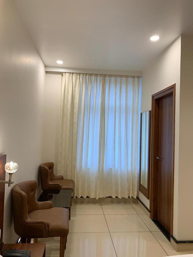 Jesta Residency Hotel Хасан Екстериор снимка