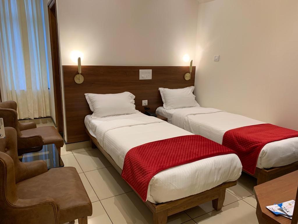 Jesta Residency Hotel Хасан Екстериор снимка