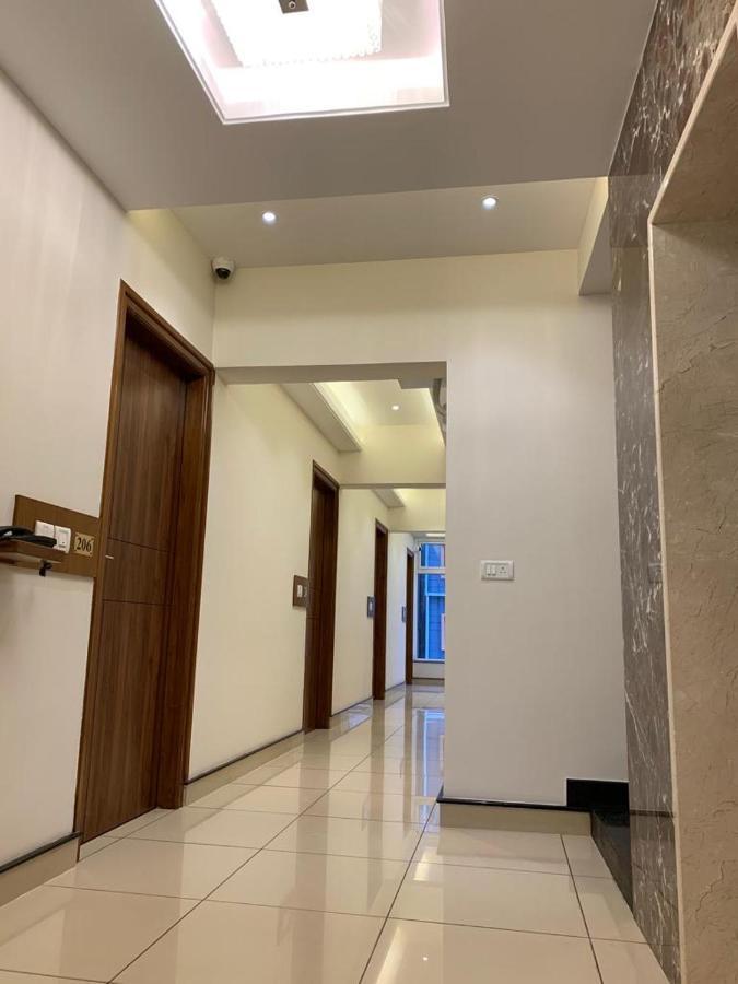 Jesta Residency Hotel Хасан Екстериор снимка