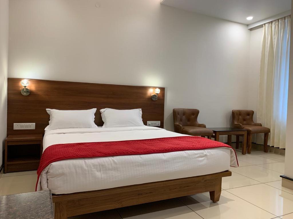 Jesta Residency Hotel Хасан Екстериор снимка