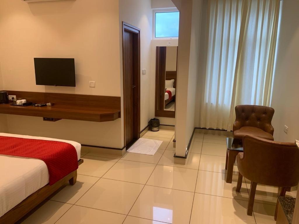 Jesta Residency Hotel Хасан Екстериор снимка